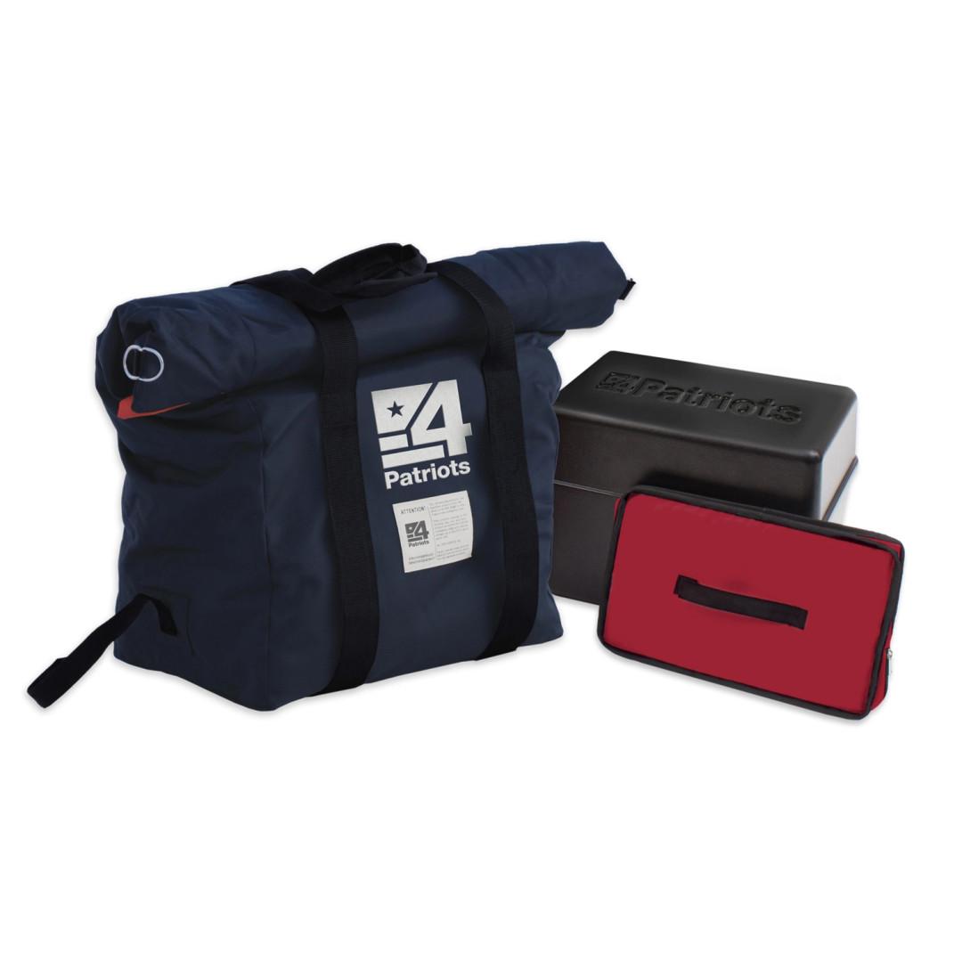 A 4Patriots emergency preparedness kit featuring a large navy blue duffle bag with the 4Patriots logo, a compact red zippered case, and a sturdy black EMP container in the background. The gear is neatly arranged to showcase portable, organized survival storage solutions.