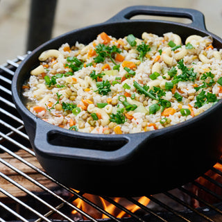 Close square view of Buckaroo Stew in a cast iron skillet over fire, 72-Hour PlatinumXL Emergency Survival Food Kit freeze-dried survival food