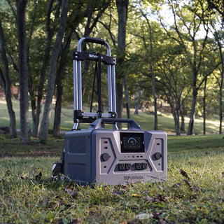 Roll & Go Foldable Generator Cart parked in sunlit woods with a fully charged 4Patriots portable solar generator on board for off-grid camping