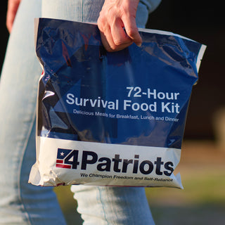 Food, Power & Light Emergency Go-Bag Starter Package 72-hour survival food kit carried by a woman at sunset, grab-and-go emergency food for disaster preparedness