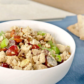 Freeze-Dried Chicken #10 Can made into chicken salad with grapes and almonds in a white bowl, a versatile survival food meal