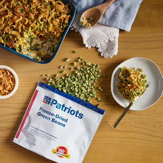 4Patriots Freeze-Dried Green Beans pouch from the Fruit, Veggie & Snack Survival Food Kit beside a green bean casserole ready to serve