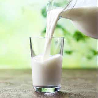 Gluten-Free Variety Recipes #10 Can milk poured from a pitcher into a glass, prepared from powdered milk, survival food drink.