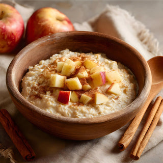Apple Cinnamon Cream of Wheat Pouch served hot in a wooden bowl topped with diced apple and cinnamon, a warming survival food breakfast