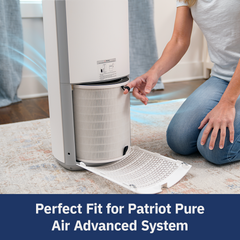 Women changing filter in Patriot Pure Air Advanced System