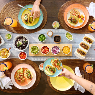 Overhead taco spread made from the Meat & Protein Deluxe Emergency Survival Food Kit with beef tacos, black beans, rice and fresh toppings