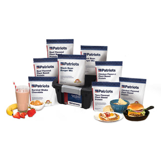 4Patriots Plant-Based Protein Kit displayed with eight pouches — two Beef Flavored Plant Based Protein, two Black Bean Burger Mix, two Chicken Flavored Plant Based Protein, and one Taco Flavored Plant Based Protein and one Survival Shake Chocolate — surrounding a black storage tote, with prepared meal examples including a chocolate shake, nachos with egg, and a burger in a cast iron skillet