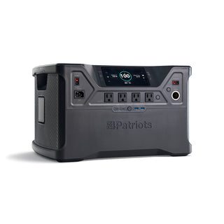 Patriot Power Solar Generator 2000X studio product shot on white, front panel showing 100% charge, four AC outlets, USB and DC ports for portable off-grid emergency backup power