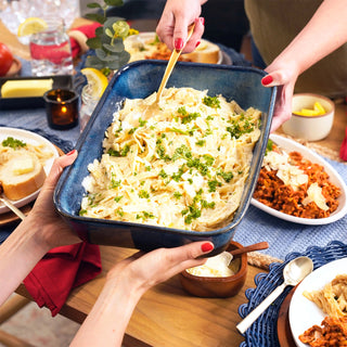 Frank's Favorite Alfredo from the Pasta Lovers Survival Food Kit being served at a shared family table
