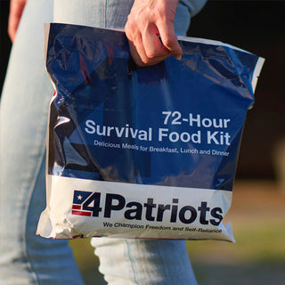 72-Hour Survival Food Kit carried by a woman outdoors at sunset, portable 4Patriots emergency food and survival food for grab-and-go disaster preparedness