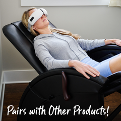 Woman laying down on the Slimline Zero-Gravity Massage Chair while using 4Patriots eye massage spa