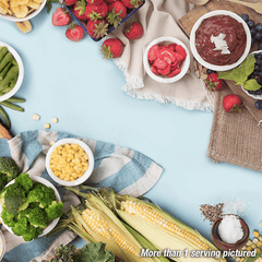 Food platter mixed with corn, strawberries, broccoli, green beans, and banana chips. More than 1 serving pictured.