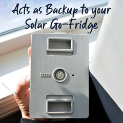 Go-fridge battery being held next to a window.