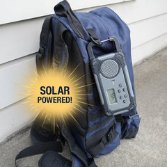 Liberty Band® Emergency Solar Radio clipped to a backpack