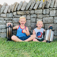 Kids with their Sun Kettle® Solar Cookers