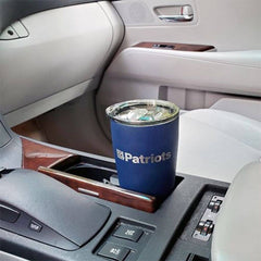 4Patriots stainless steel travel tumbler in a cupholder inside a car