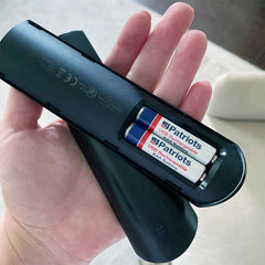 USB-Rechargeable AAA Battery Kit being used in a remote control