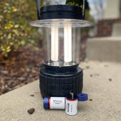USB-Rechargeable D Battery Kit next to a lantern